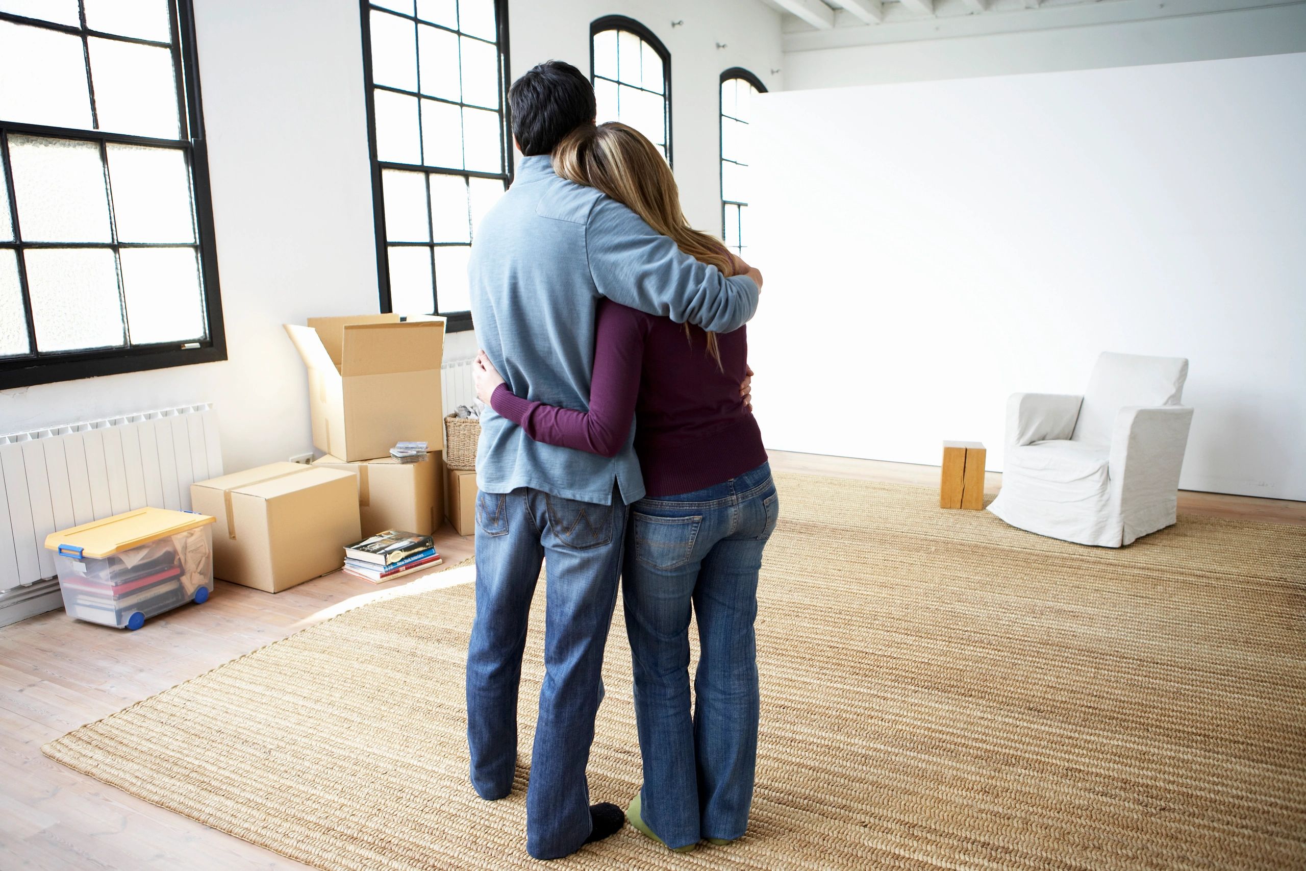 Couple receiving keys to their new home